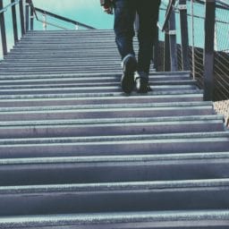 Man walking up stairs