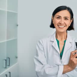 Photo of a smiling audiologist