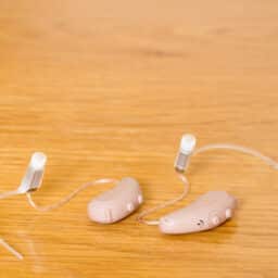 Close-Up Of Hearing Aid On Table