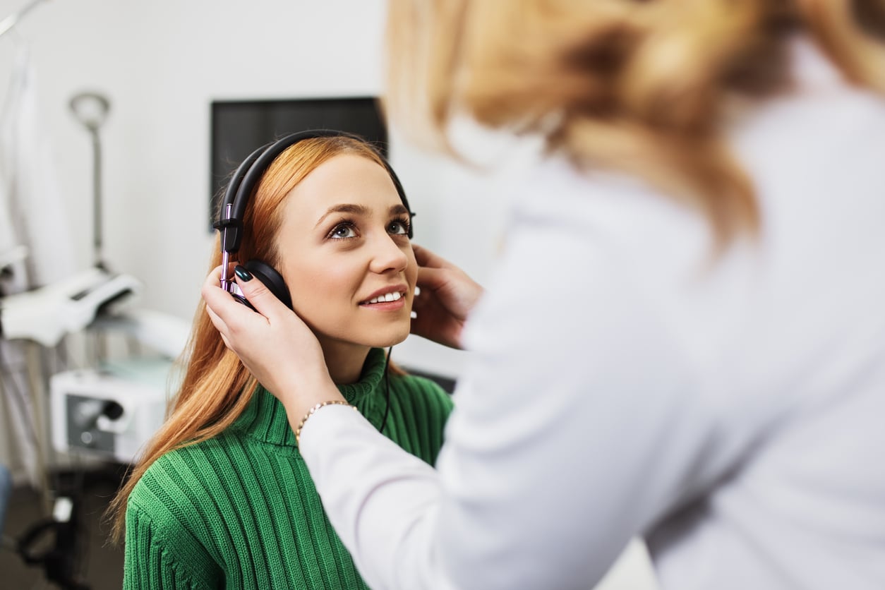 Woman gets hearing test