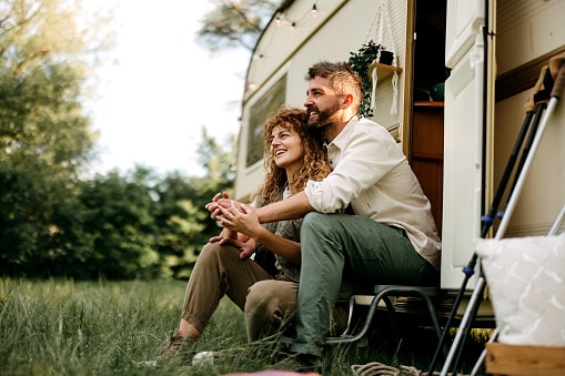 Couple enjoying camping in their RV camper.